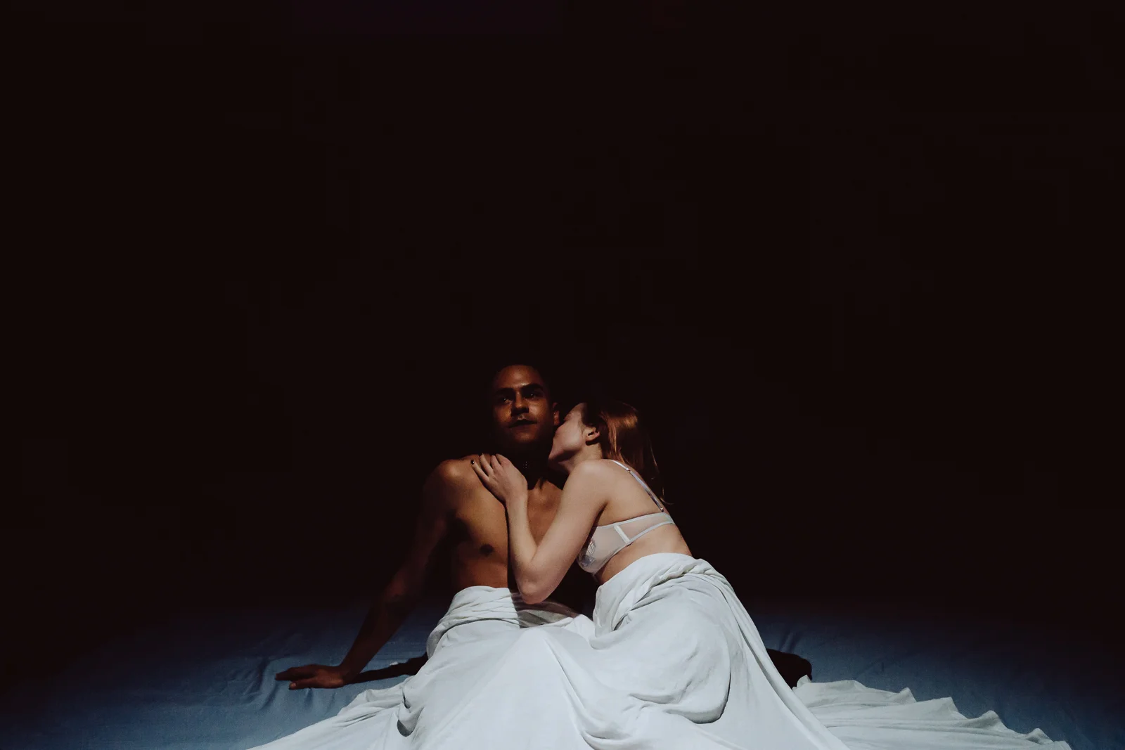 Photo by Tye Carson | Design by Alison Yanota | Projection design by Tyler Klein Longmire | Image of Jay Northcott and Mikaela Cochrane