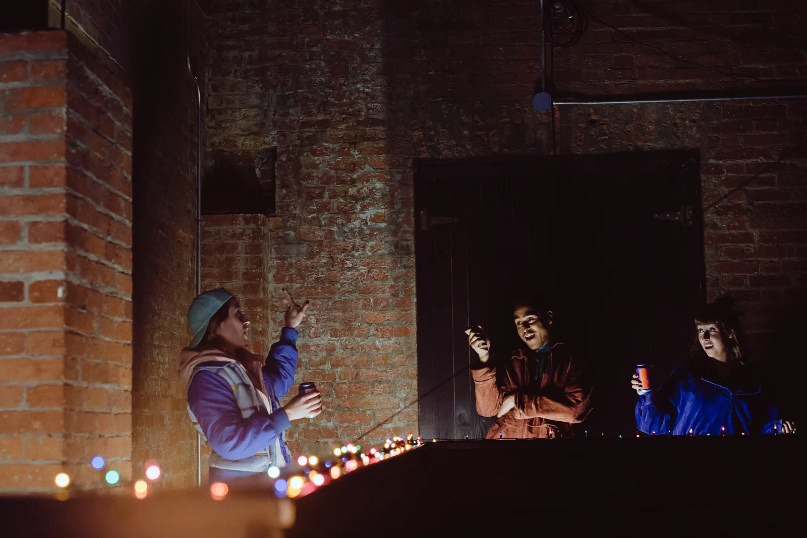 Photo by Tye Carson | Design by Alison Yanota | Projection design by Tyler Klein Longmire | Image of Mikaela Cochrane, Jay Northcott, and Zoe Glassman