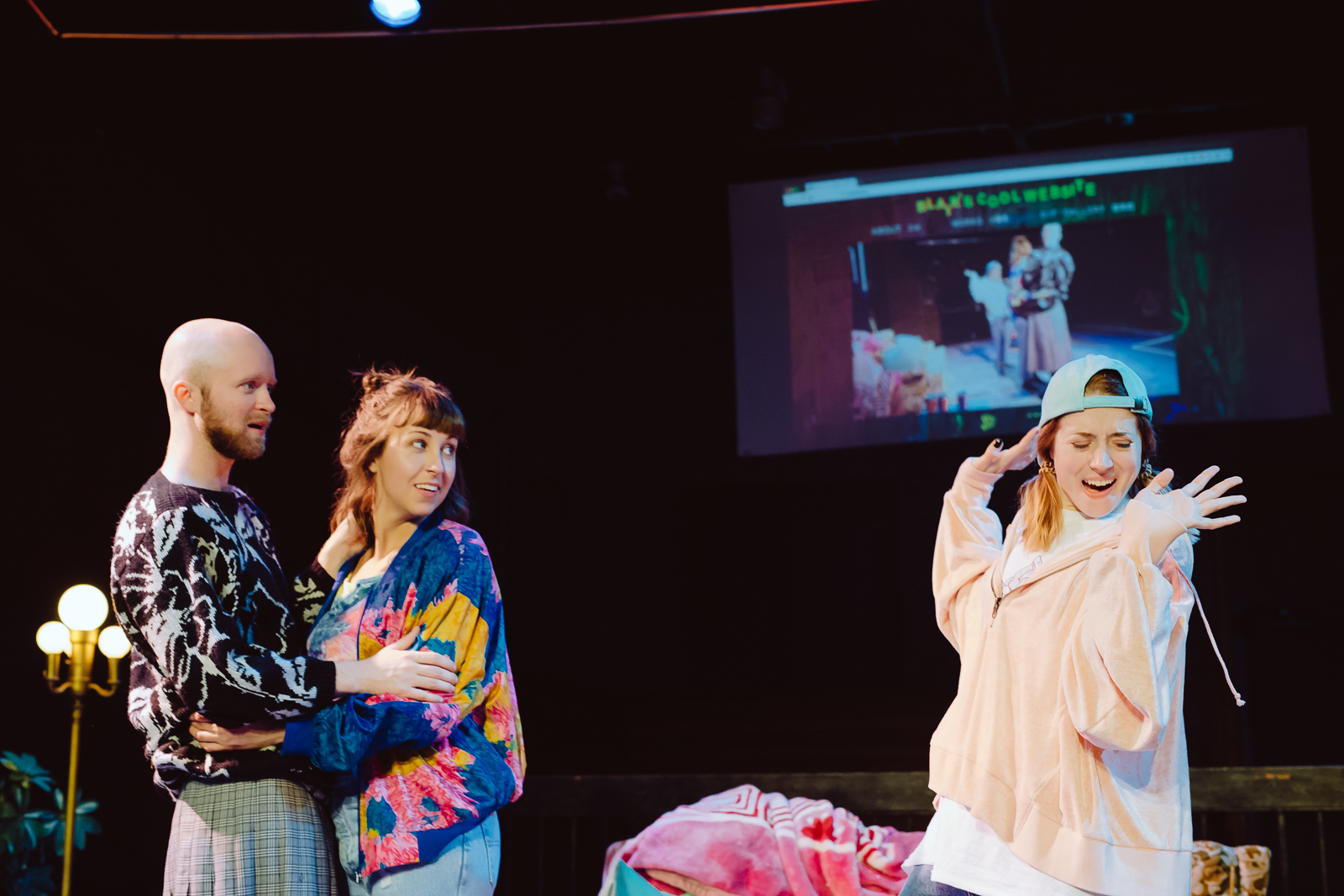 Photo by Tye Carson | Design by Alison Yanota | Projection design by Tyler Klein Longmire | Image of Evan Medd, Zoe Glassman, and Mikaela Cochrane
