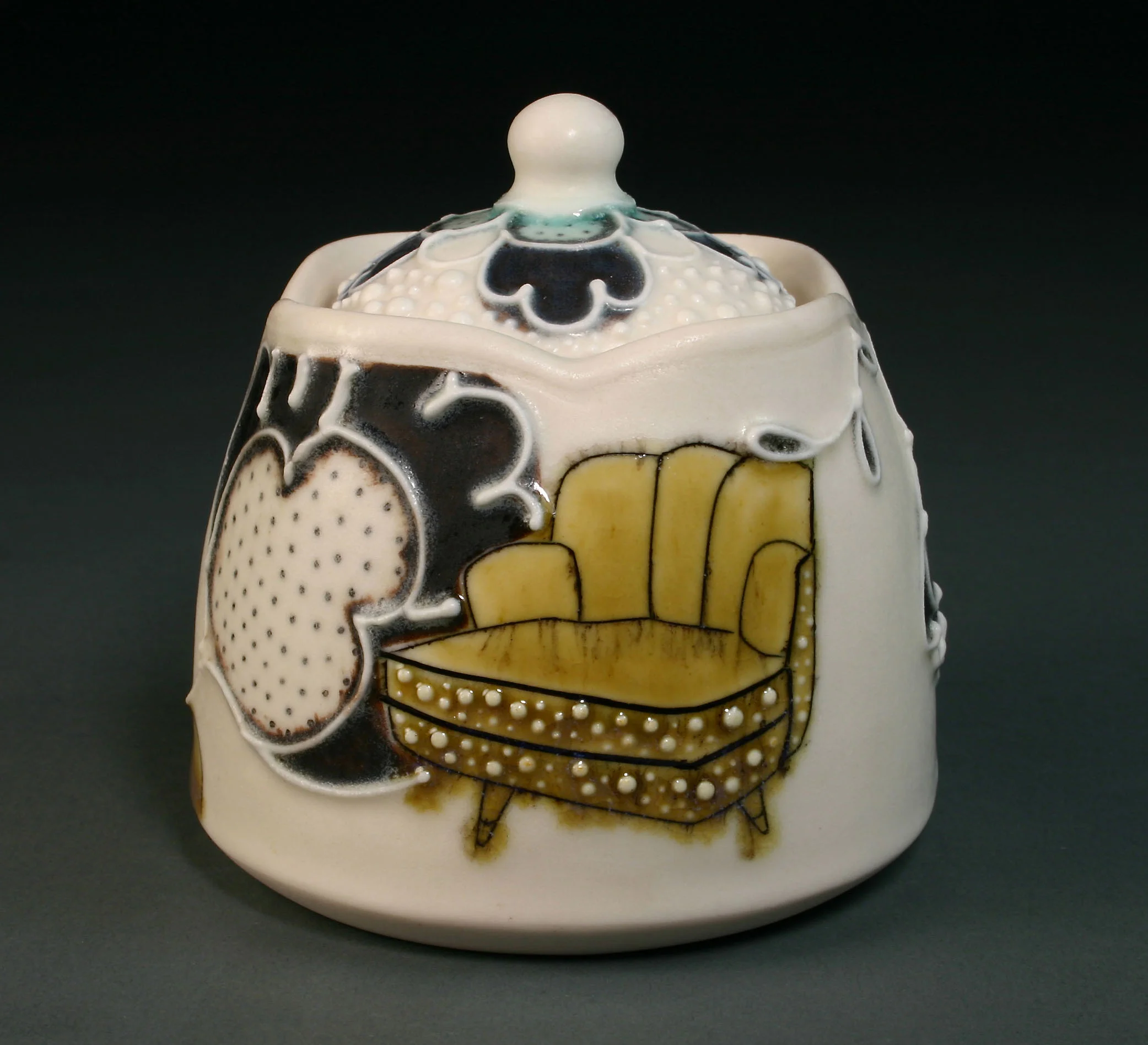  &nbsp;&nbsp;Porcelain decorated with hand drawn mishima, underglaze, slip trail, and glaze.  3.5" x 3" x 3" 