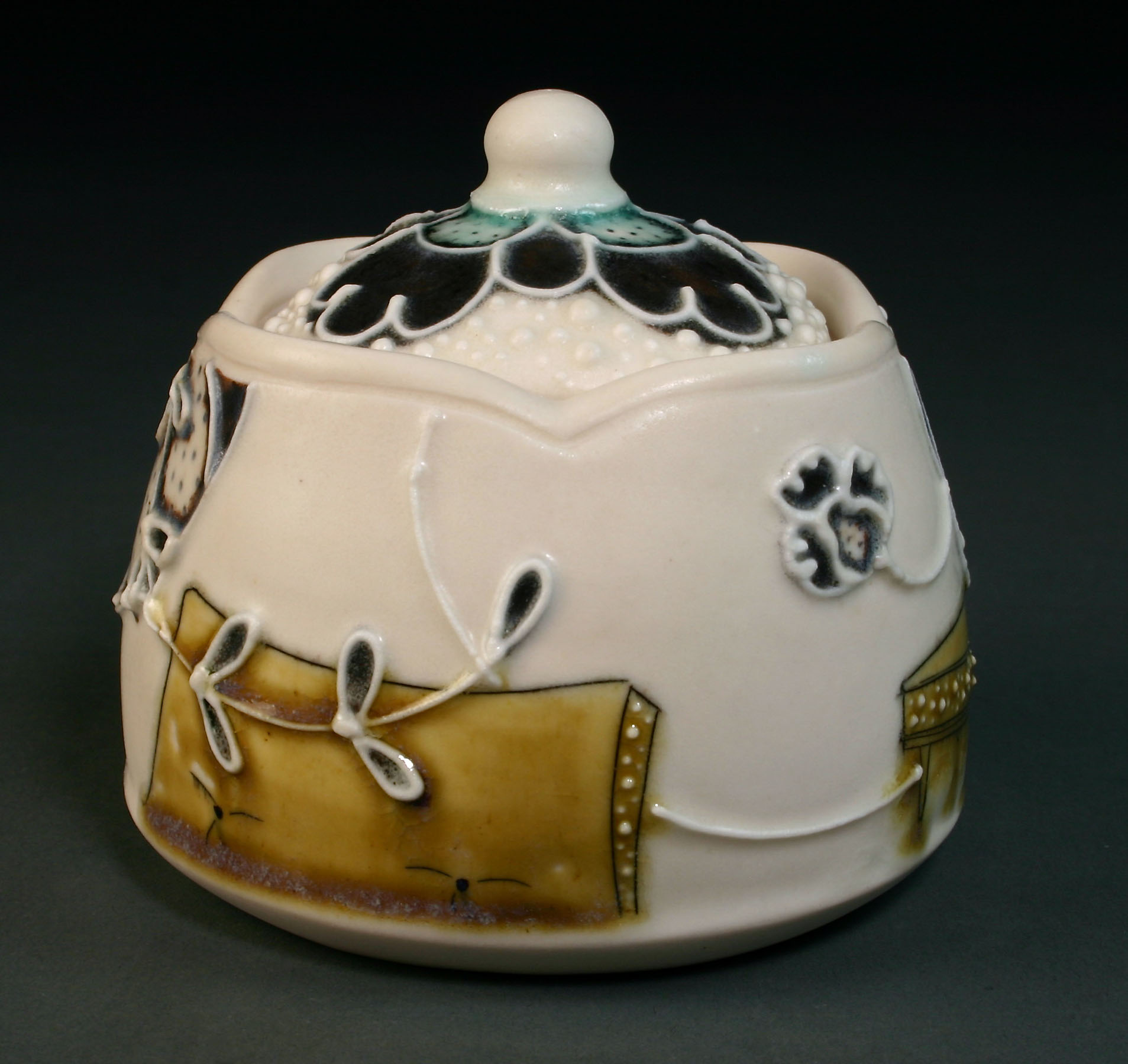  Porcelain decorated with hand drawn mishima, underglaze, slip trail, and glaze.  3.5" x 3"&nbsp; x 3", #16 