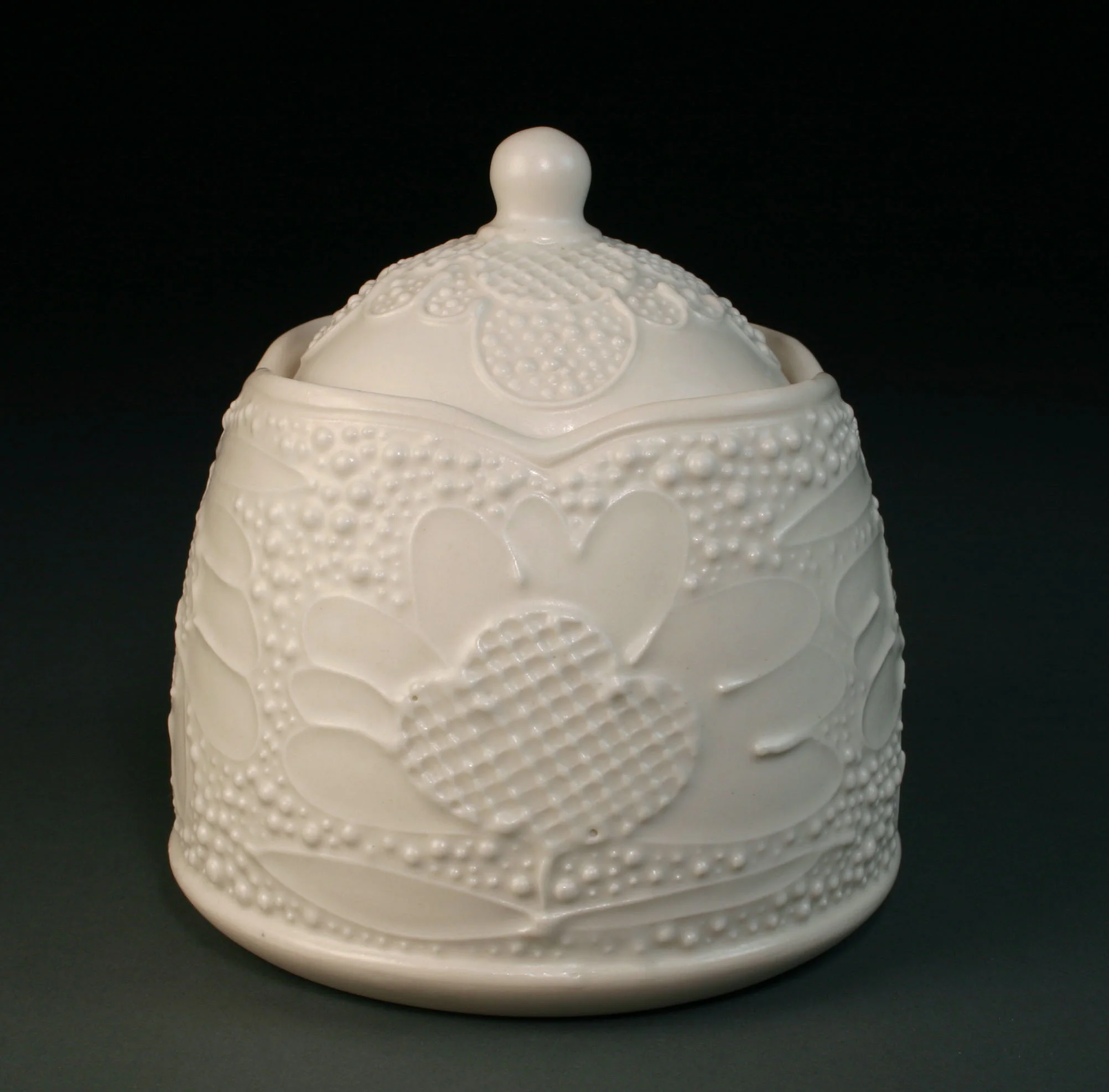  Porcelain decorated with slip trail. &nbsp;Wheel thrown body and slab built lid. &nbsp;  5" x 4" x 4", #3 