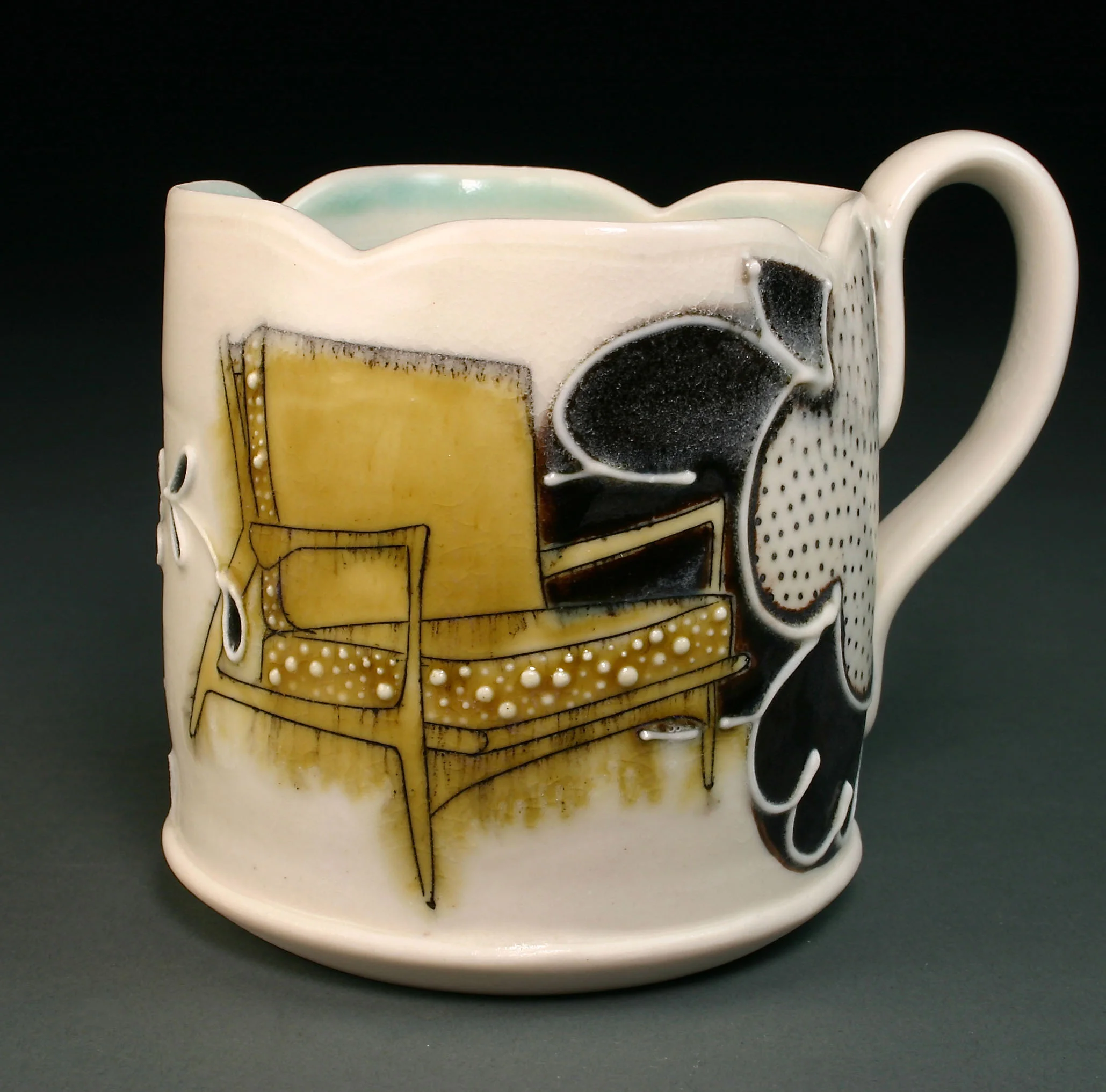  Porcelain decorated with hand drawn mishima, underglaze, slip trail, and glaze.  3.5" x 4"&nbsp; x 4" 