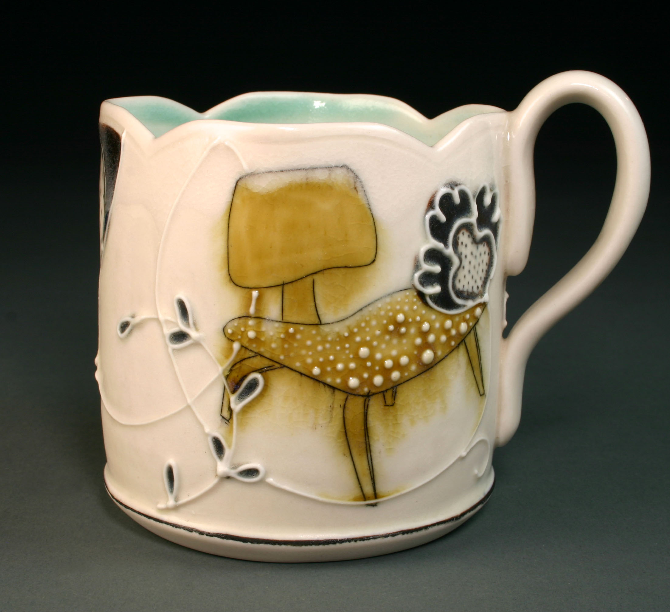  Porcelain decorated with hand drawn mishima, underglaze, slip trail, and glaze.  3.5" x 4" x 4" 