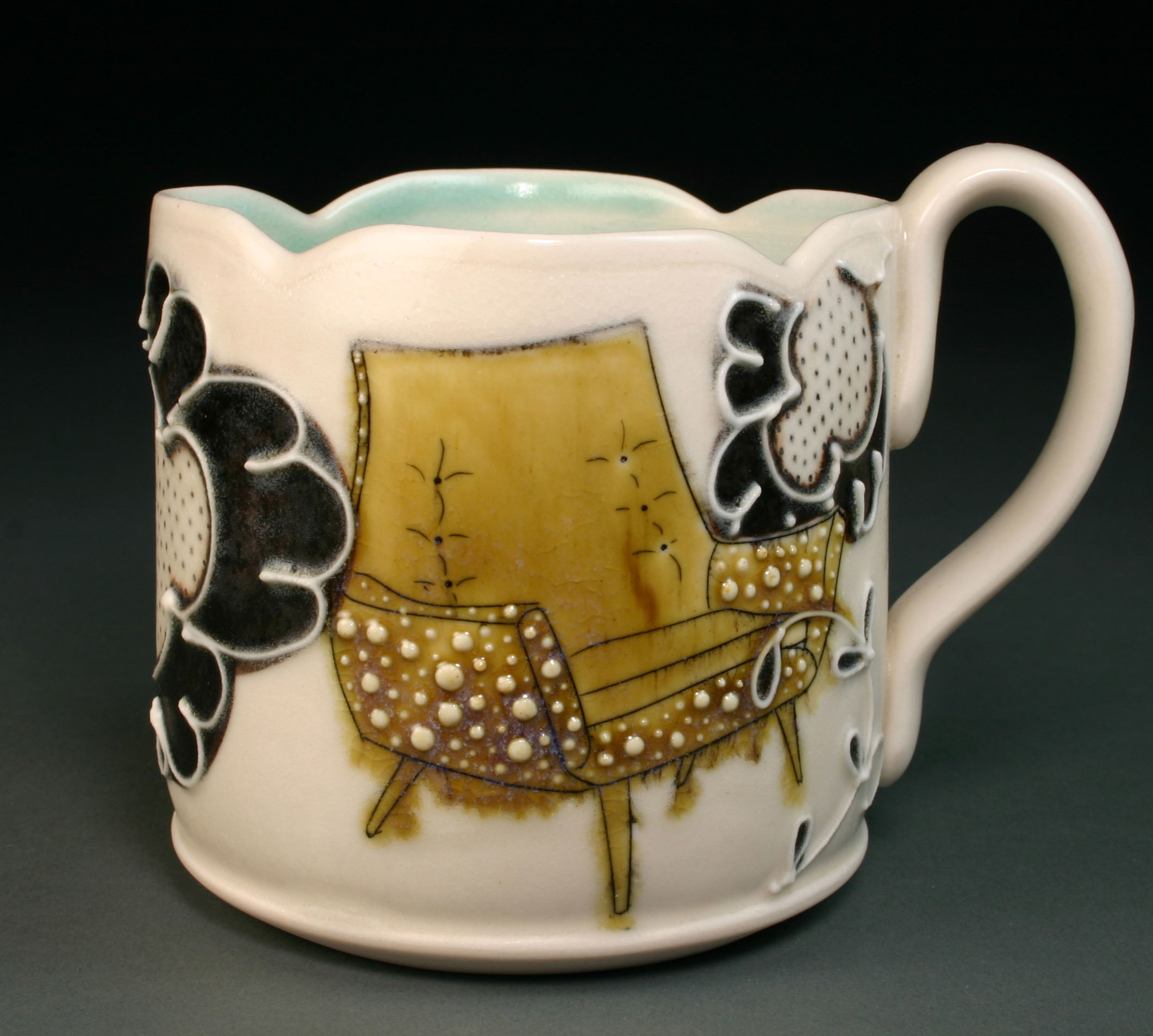  Porcelain decorated with hand drawn mishima, underglaze, slip trail, and glaze.  3.5" x 4" x 4" 
