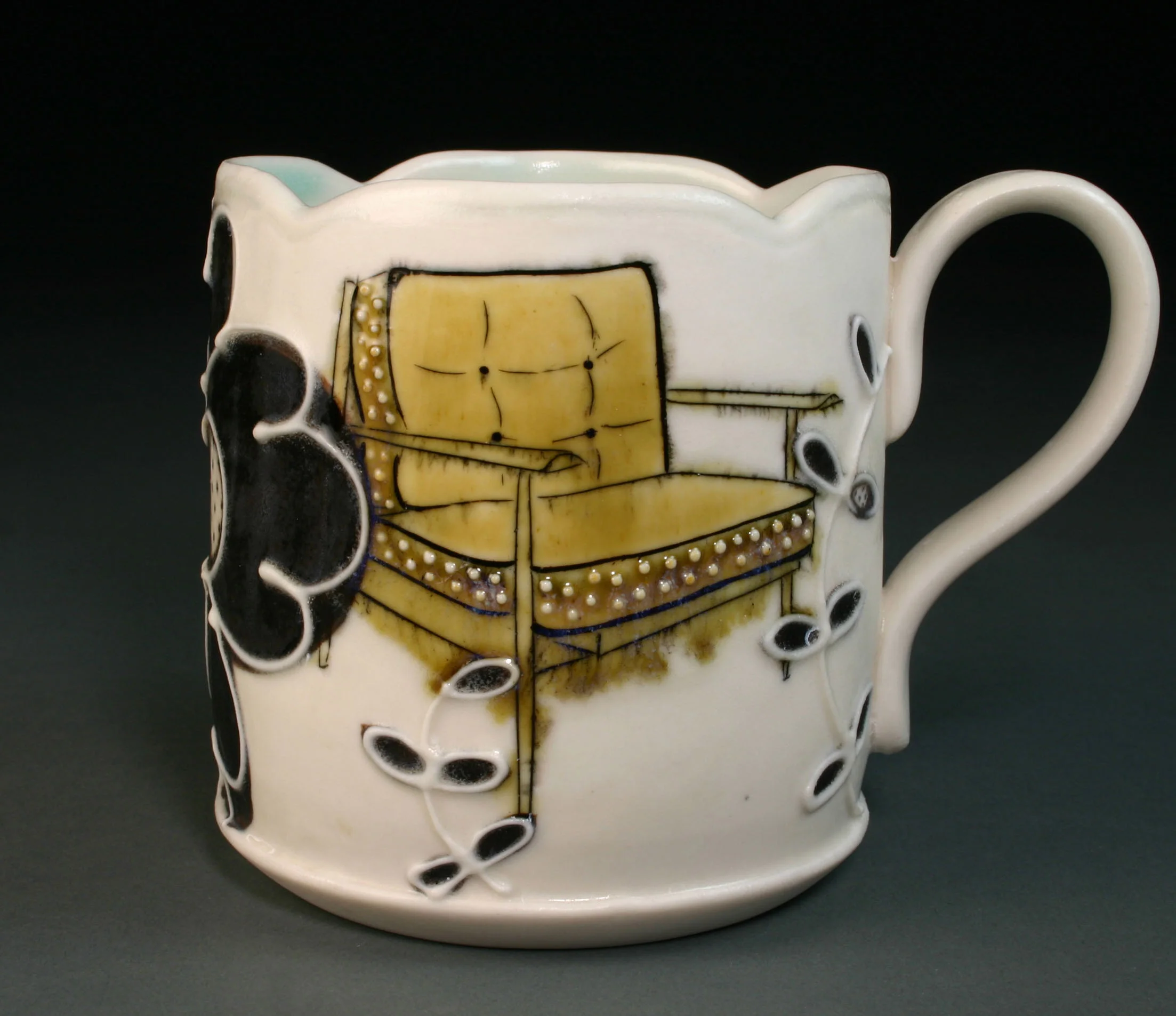  Porcelain decorated with hand drawn mishima, underglaze, slip trail, and glaze.  3.5" x 4" x 4" 