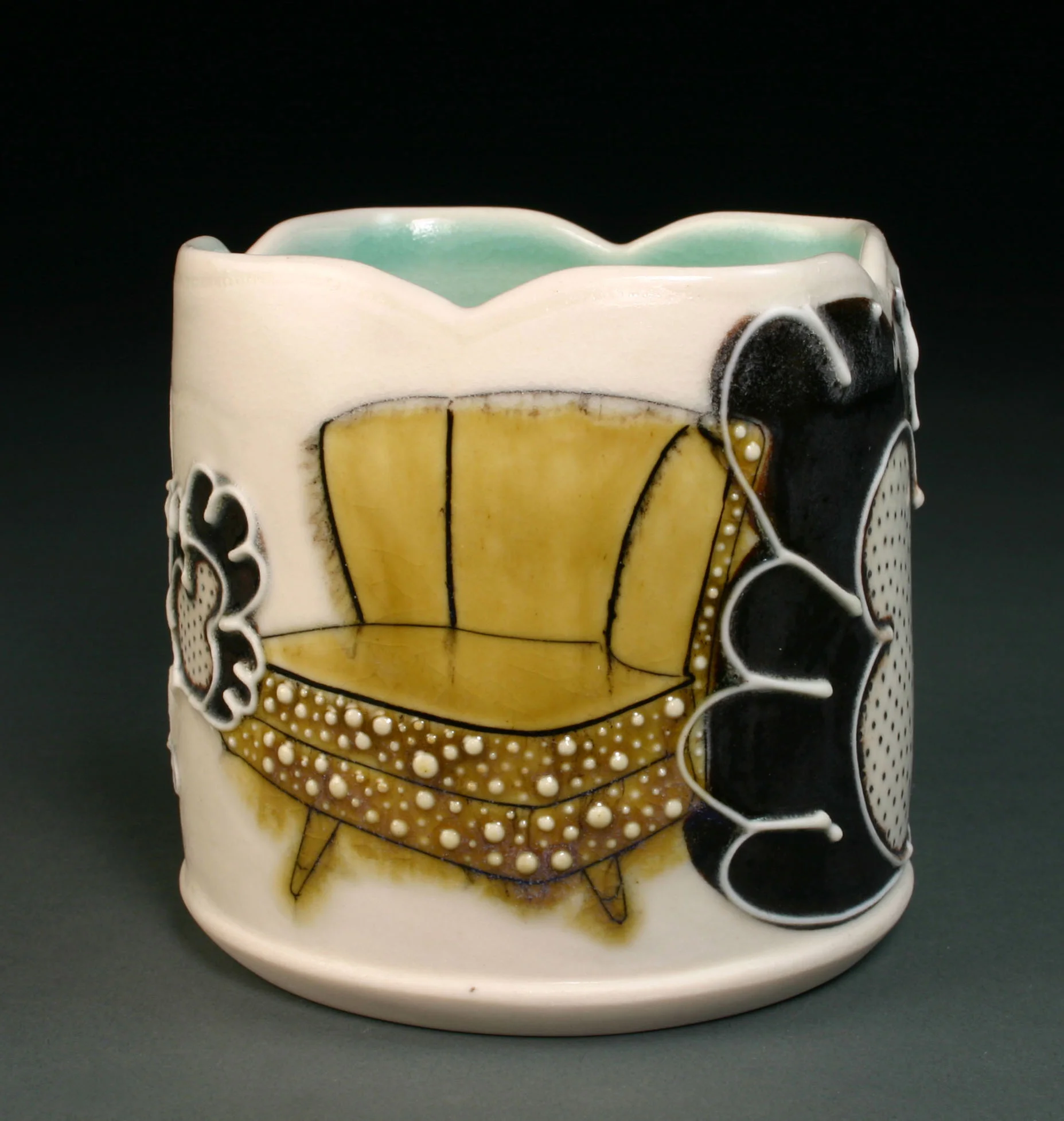  Porcelain decorated with hand drawn mishima, underglaze, slip trail, and glaze.  3.5" x 4" x 4" 