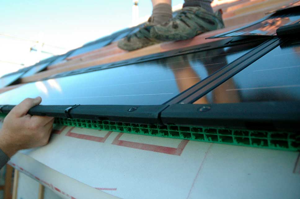  Close-up of side-by-side panels with a soaker in the top-right. These go under each join to drain off water. 