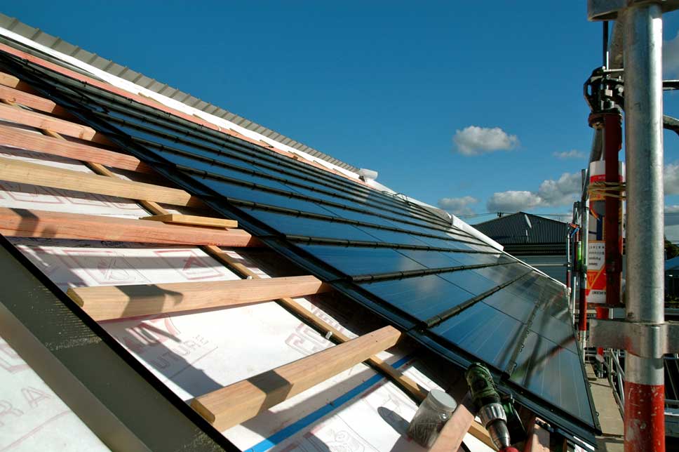  Shot prior to the last column being installed with flashing in the foreground to drain water off the roof edge. 