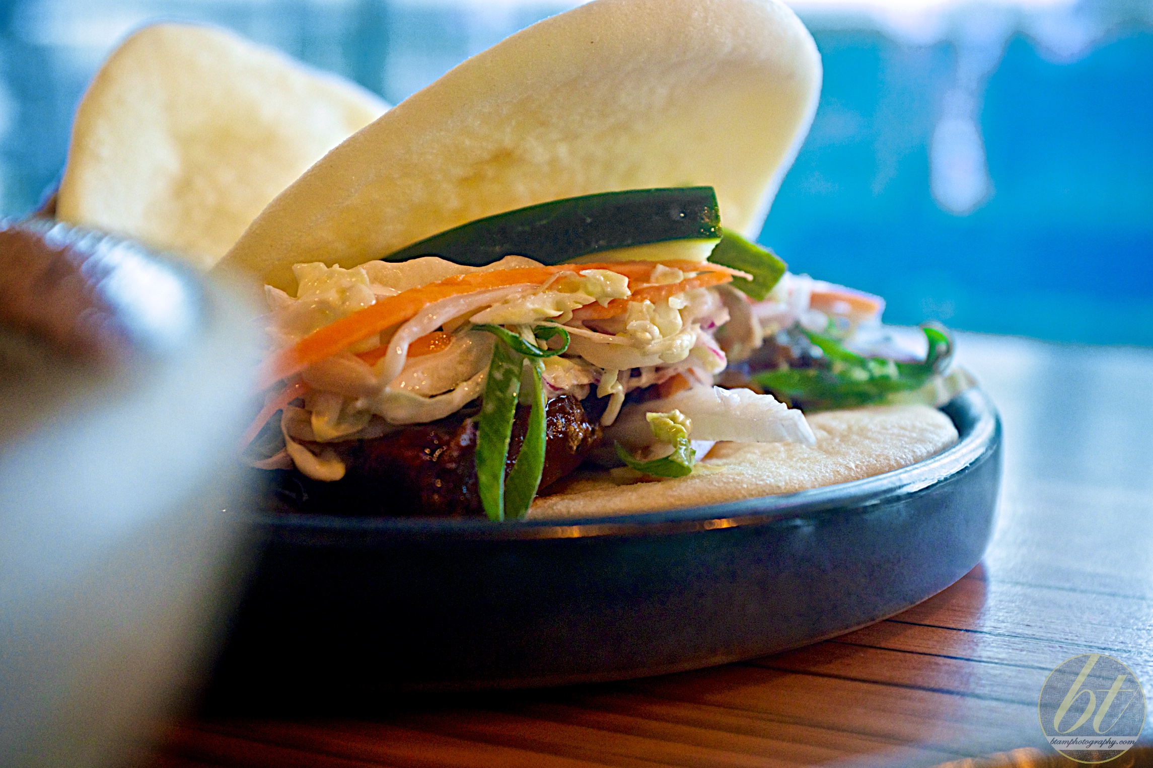 Pork belly bao with asian slaw ($8)