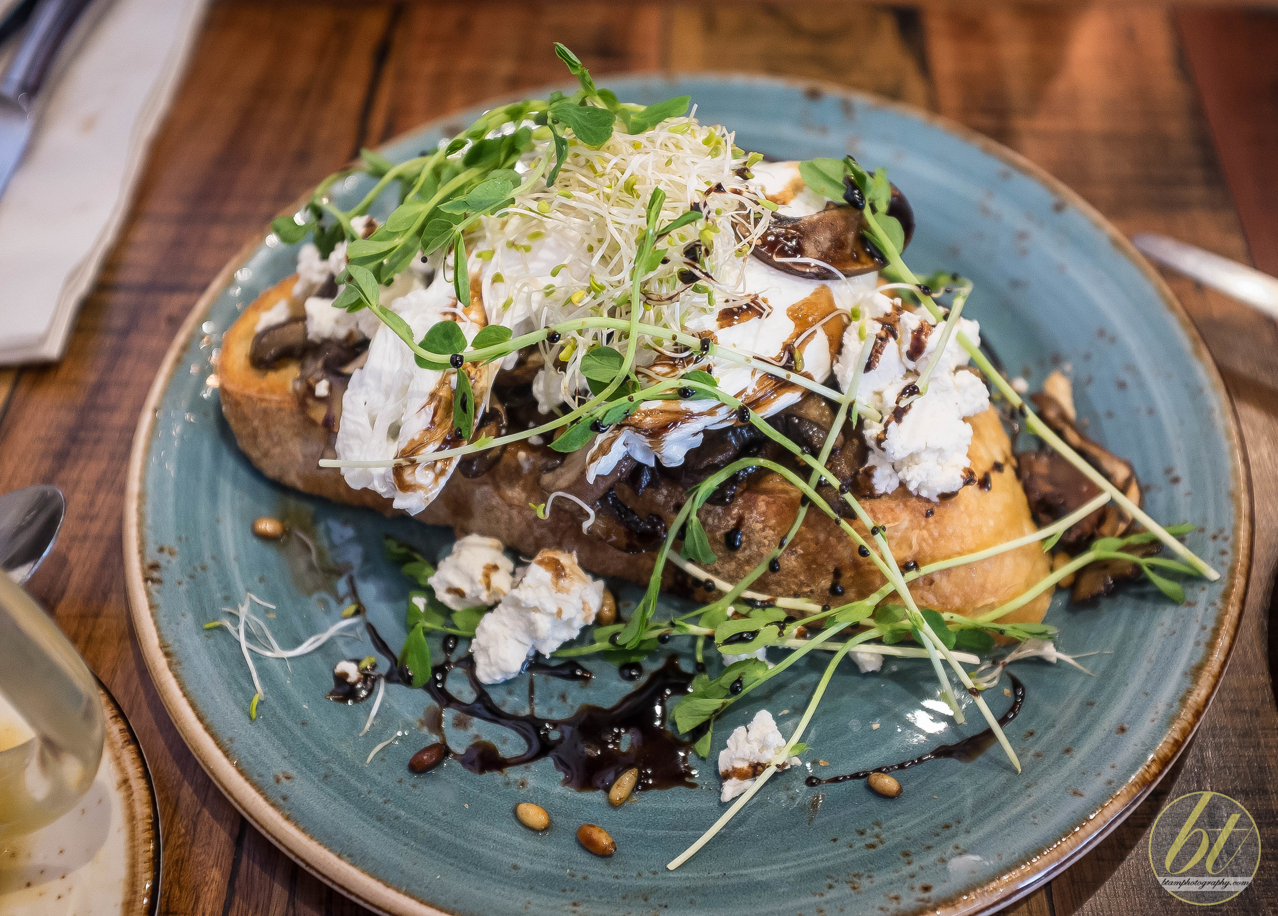 The Field ($17) - Portobello mushrooms, poached eggs, goats cheese, balsamic reduction, shaved truffle & pine nuts on crusty bread