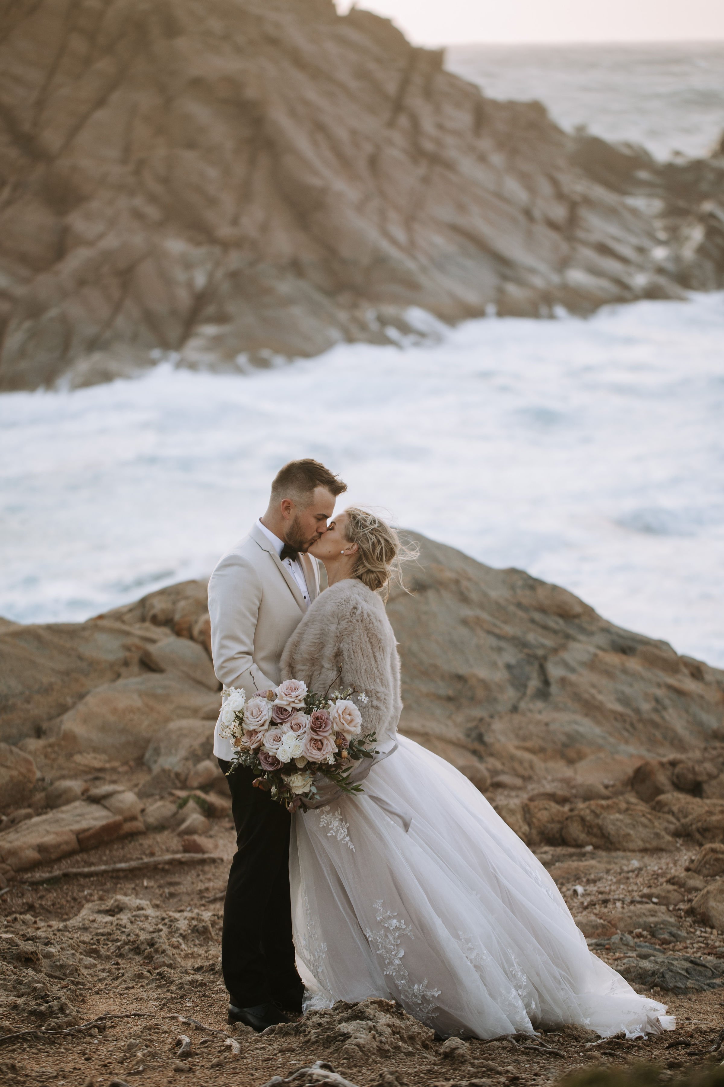 FT bride groom jacket kiss.jpg