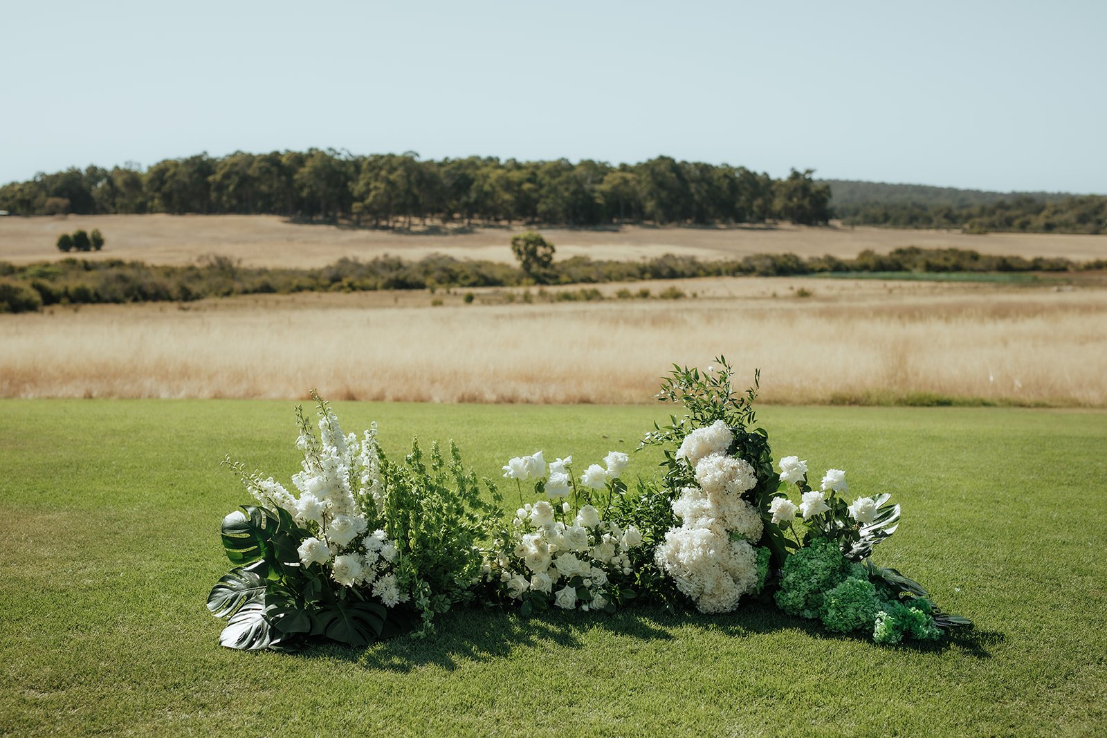 Lara-Brandon-ceremony-floor-arch.jpg