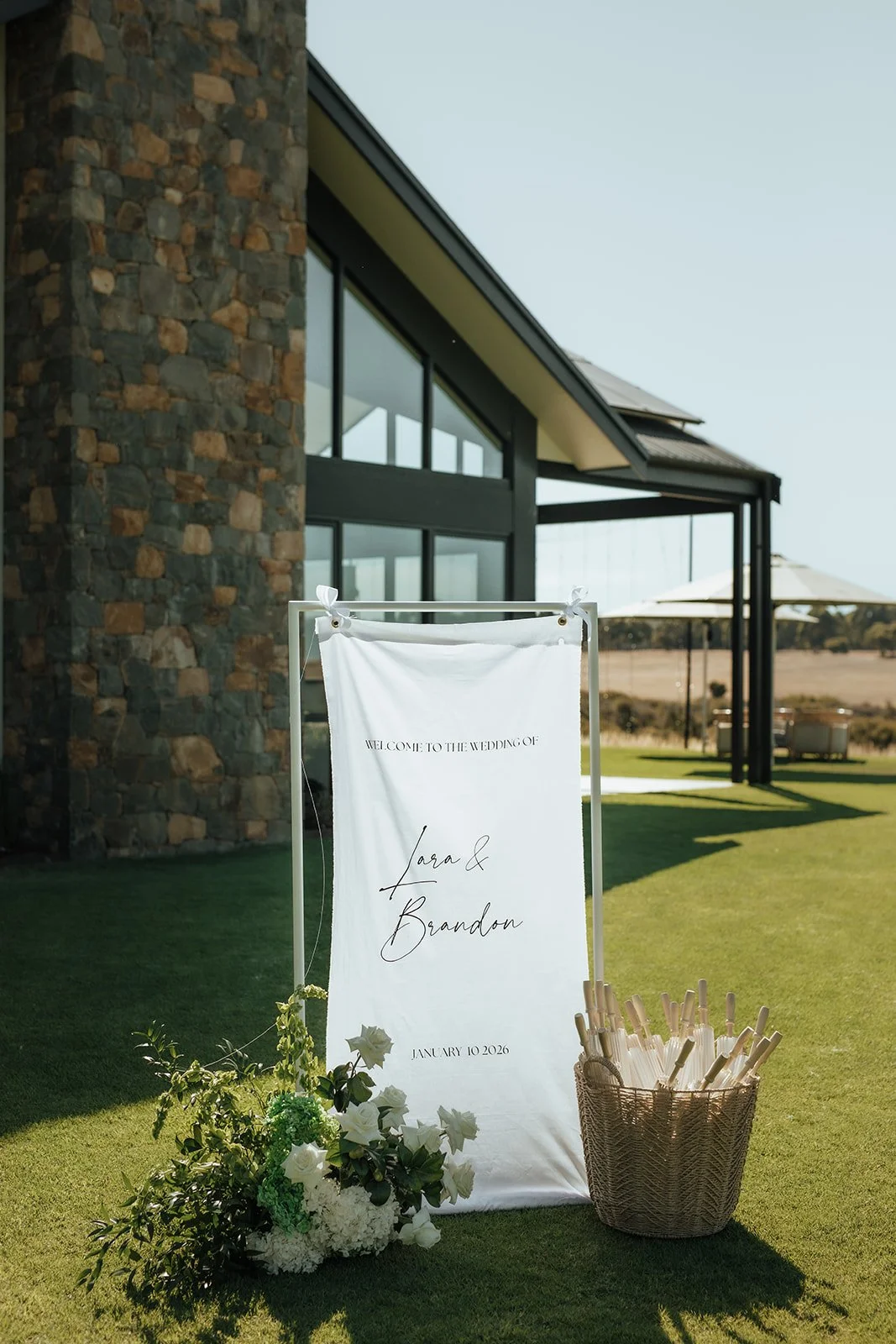 Lara-Brandon-welcome-sign-florals.jpg