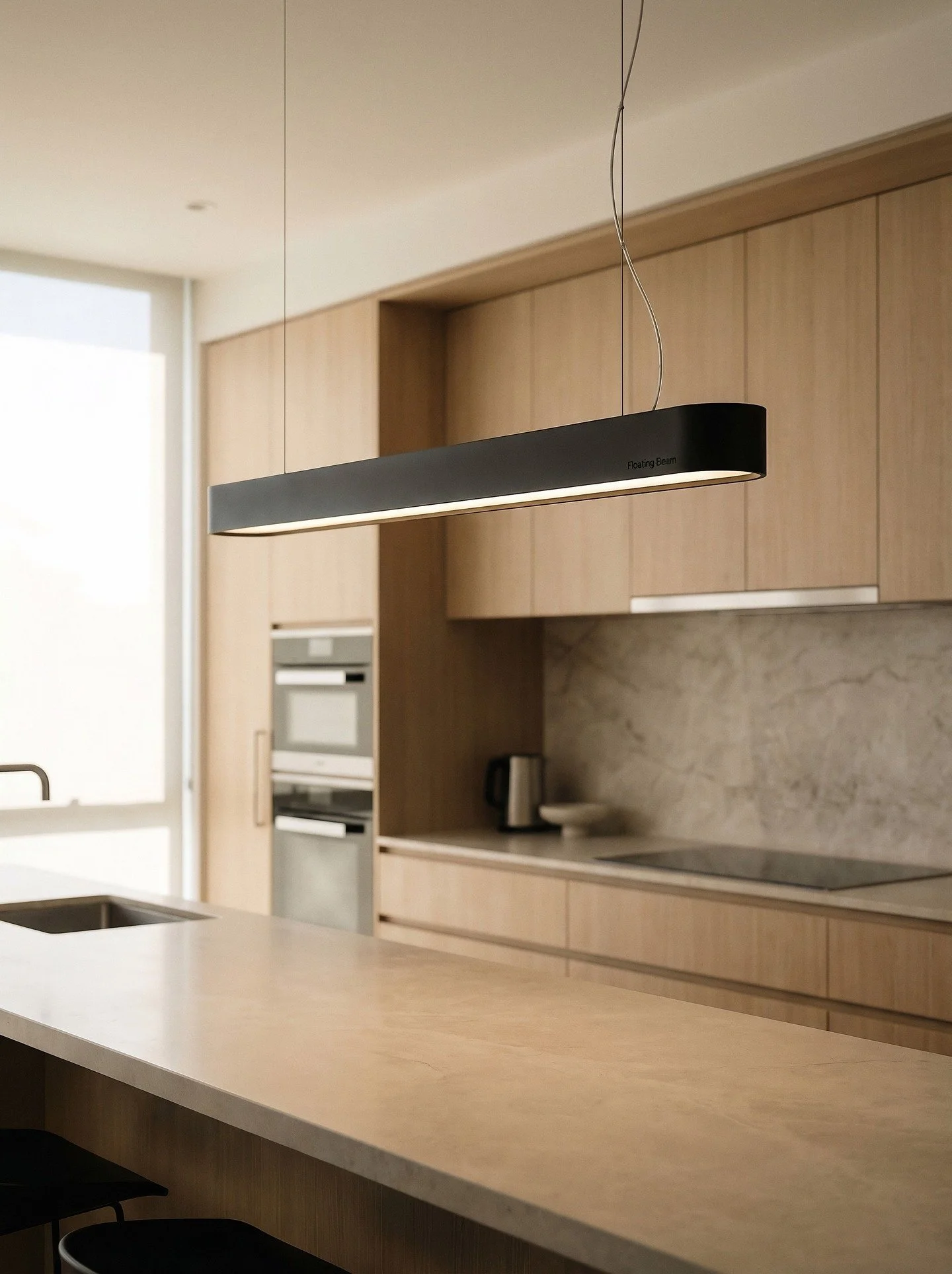 Light as an object. Not just a source.
The Floating Beam pendant is built around a singular design intent, that a linear luminaire should carry the same formal rigour as the architecture it inhabits. The extruded body is shallow and elongated, with a