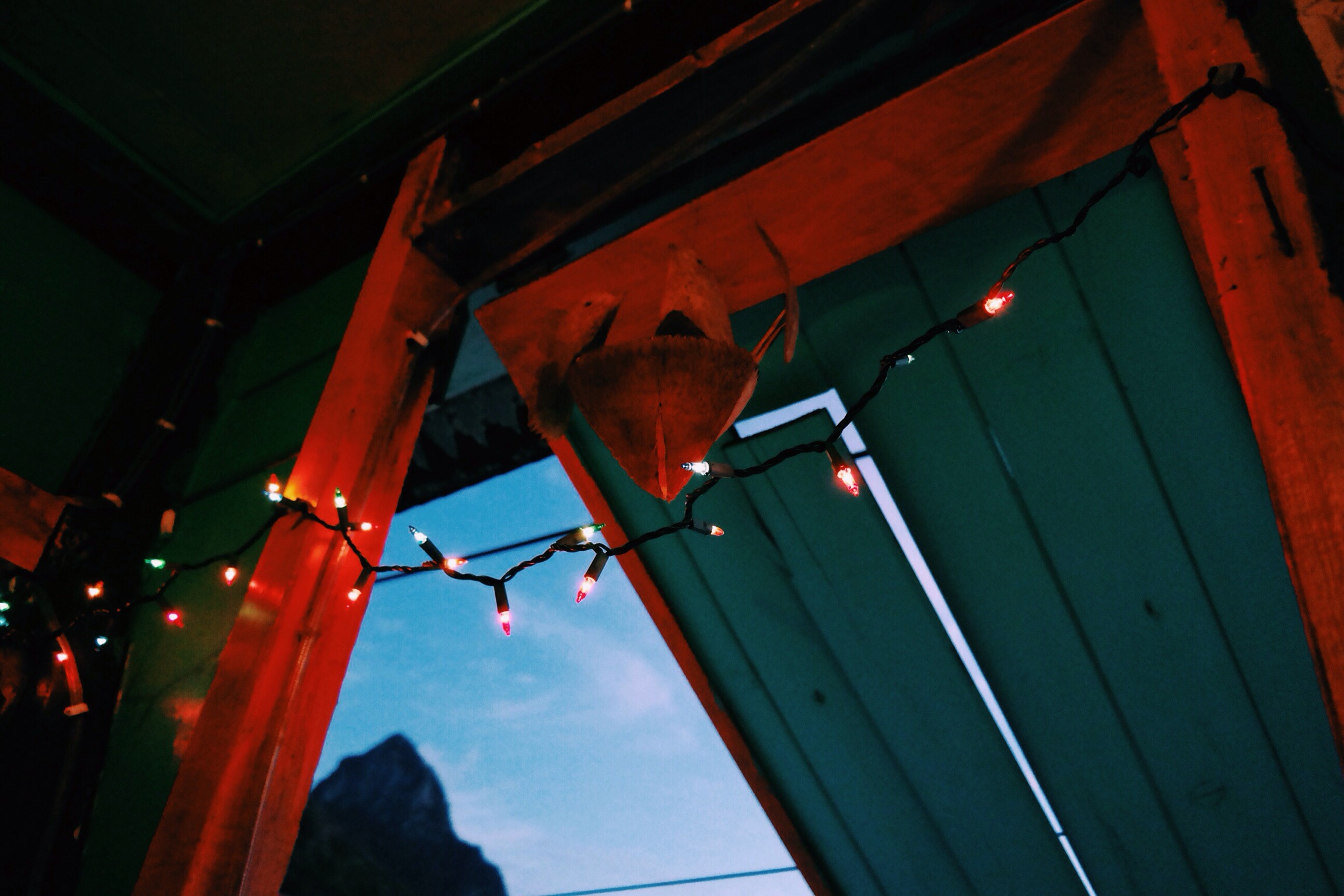 fairy lights and coconut carvings for atmosphere in a local restaurant