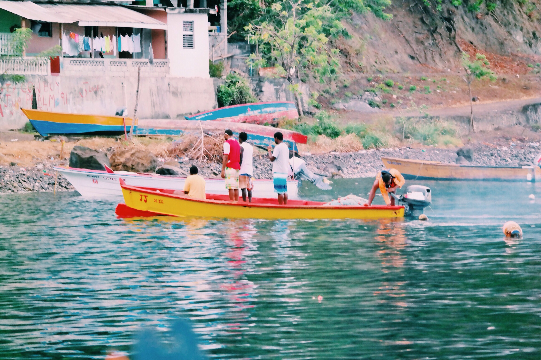 locals preparing for the day - selling fruit, moorings and anything else you might need from their boats...