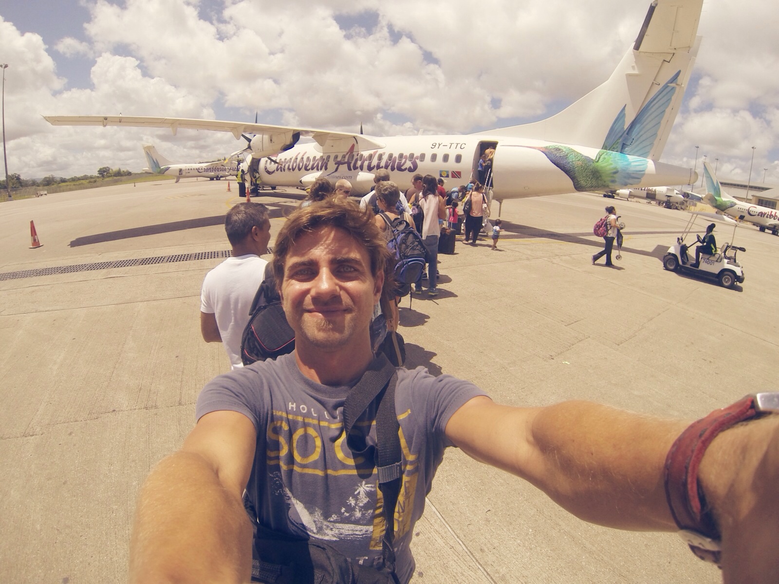 boarding his flight from Trinidad to Tobago where he caught his flight to London Gatwick