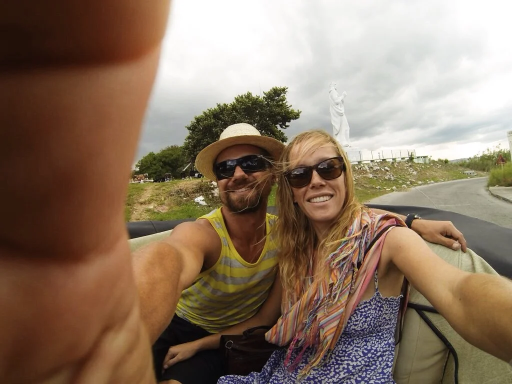 vintage car ride with El Cristo de La Habana in the back