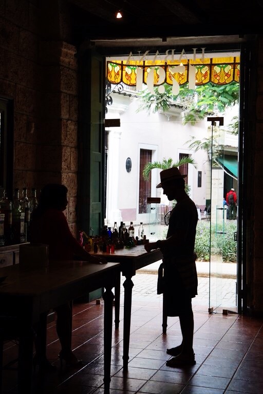  spoils from Museo Del Chocolate (left) and Rufus testing the hand made perfumes in Old Havana