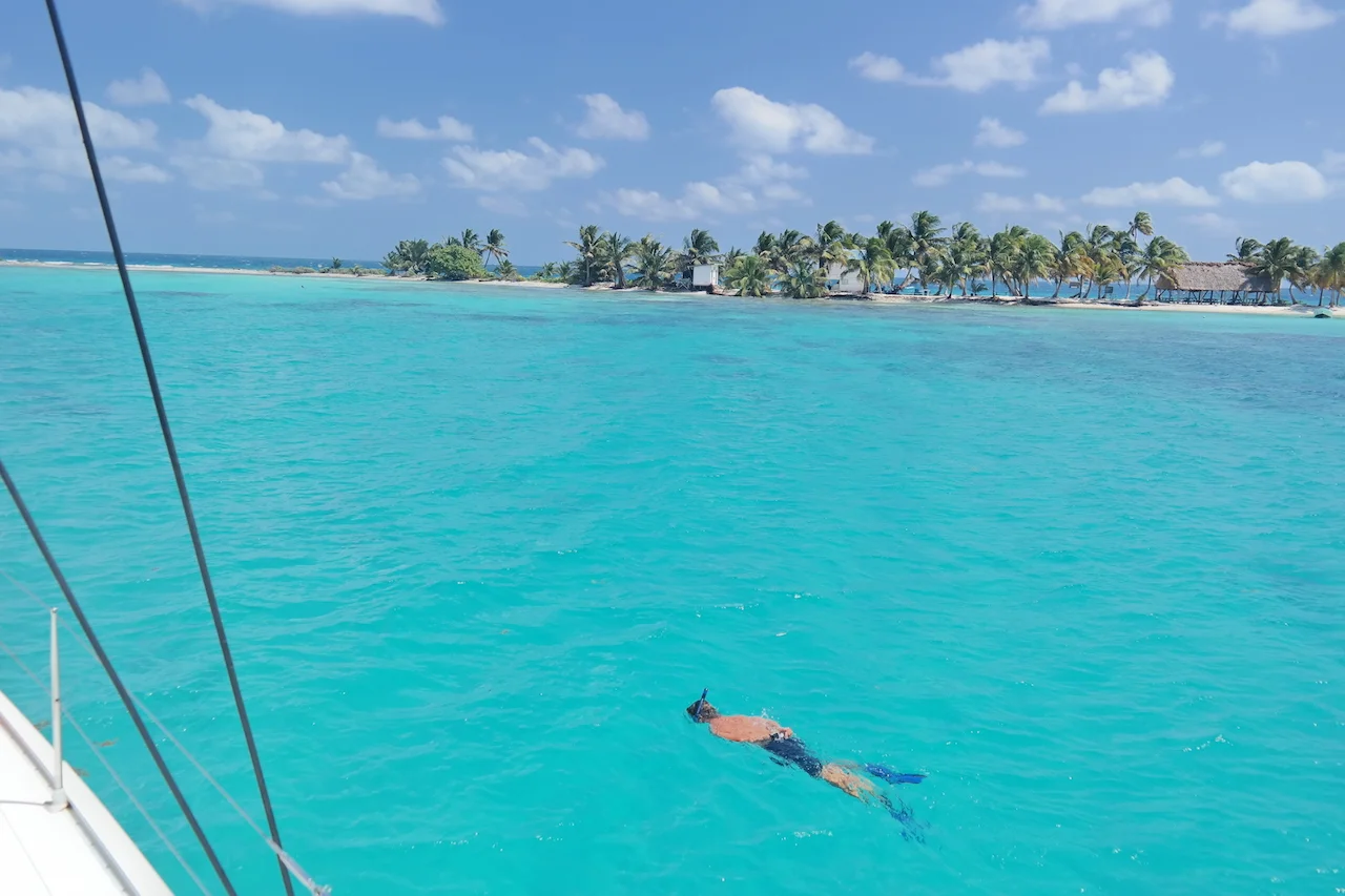 exploring Laughing Bird Caye's snorkeling spots