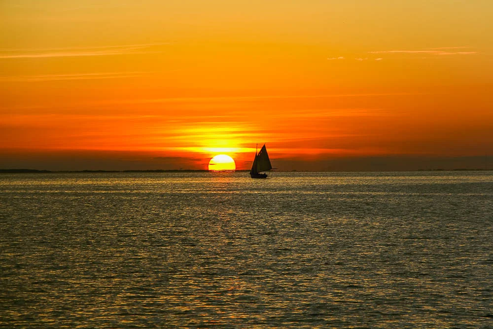 sailboat sunset