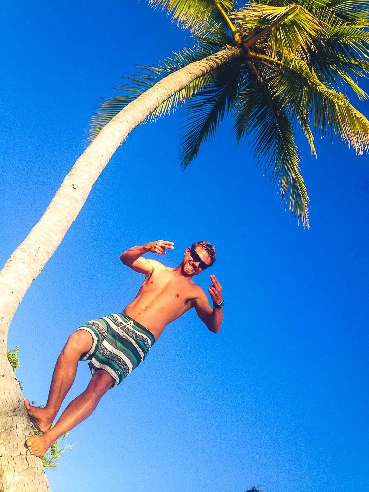 chasing a crab up a tree, doing his best crab claw impression