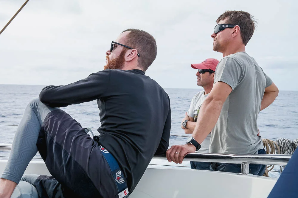 Engineer, Captain and Mate considering sail configs on the delivery from Newport RI to SXM