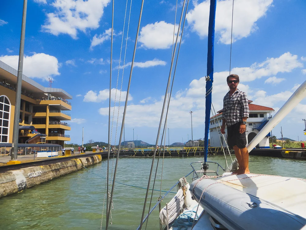 in the last lock before we exit into the Pacific - Rufus standing on the foredeck, posing for the Canal cameras as our families watch online
