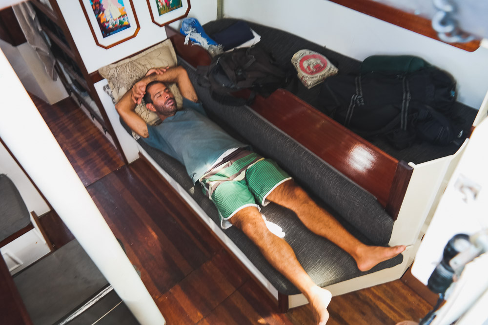 most of the canal transit is a waiting game - João catching some zzz while we wait for things to happen