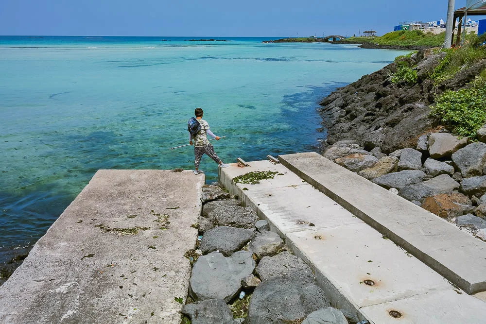 a young fisherman at Hamdeok Beach
