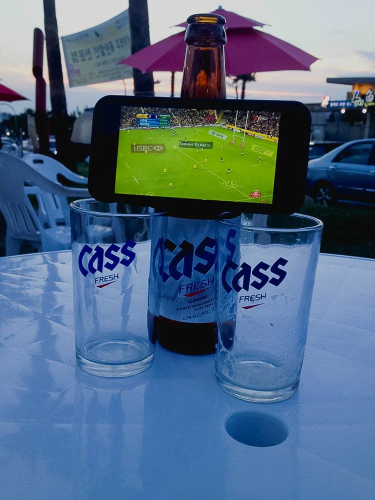 watching the rugby on Faan's iPhone. Photo Credit: Faan Rabie