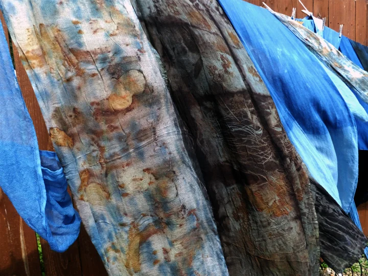 The eco printed scarf on the left was dipped in indigo BEFORE eco printing, the darker scarf on the right was indigo-dipped AFTER eco printing.