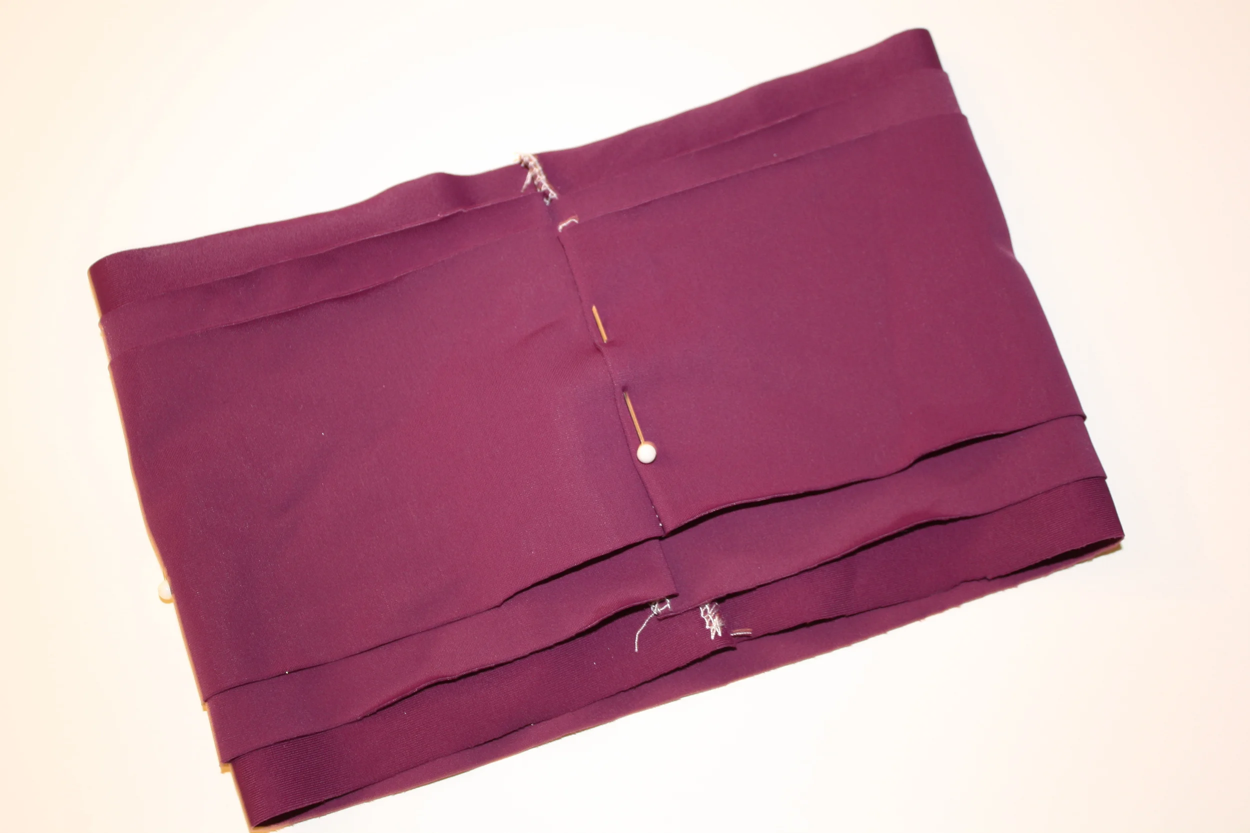 4) Layer each loop on top of the others. I started with the widest and ended with the narrowest. I also made the seam allowance on the widest strip sandwiched between the middle strip. This is so when the ruffles are sewn onto the leggings the seam allowance won't be on the outside.