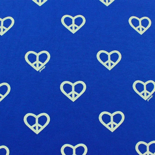 Jersey Sweatshit knits are perfect for a cute and casual play version - now with a fleece backing this will be thicker and warmer than cotton, but that is great for cool summer nights, windy days at the beach, or rainy days if you live in the North East like me. With almost no stretch, this fabric will cut and sew up just like a non-knit. This print is on sale for $2.45 - but they have some great solids as well!