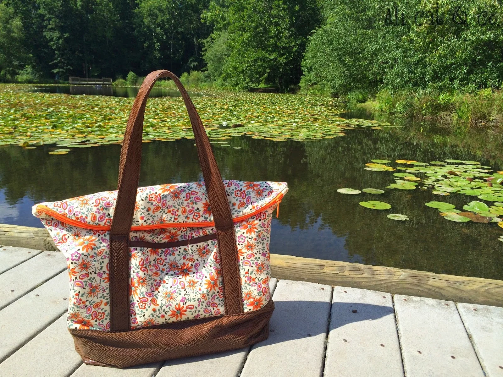 Brianne paired snakeskin with a floral print for her fall inspired Senna Bag