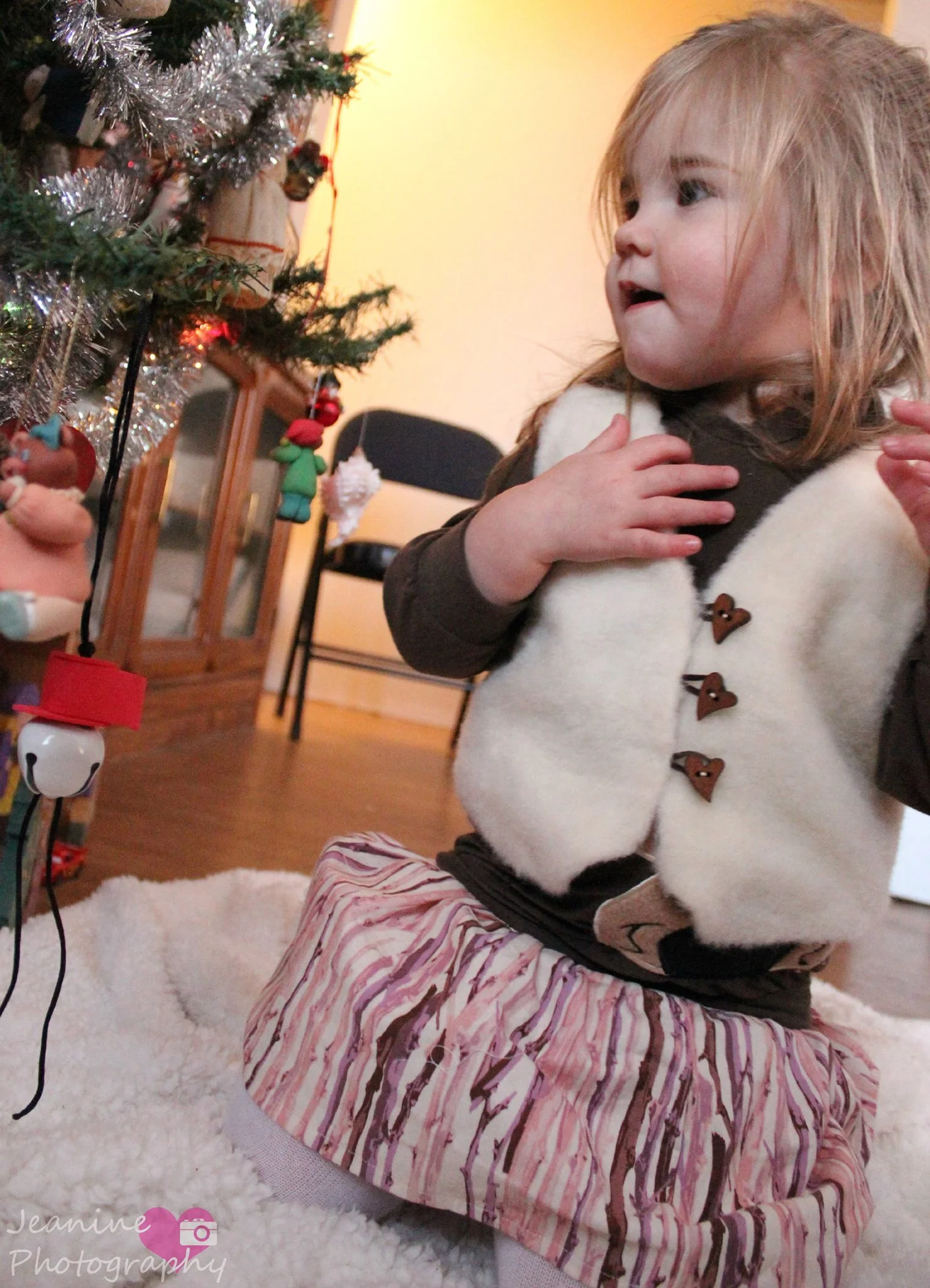 I use the Scientific Seamstress perfectly preppy skirt with the simple gathered option and attached shorts option, the Scientific Seamstress all the rage raglan with the hood option and the Scientific Seamstress festive vest.