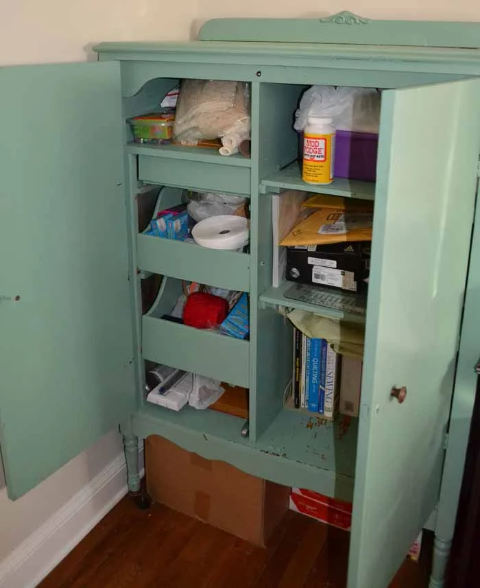 Filled with books, office supplies, sewing supplies