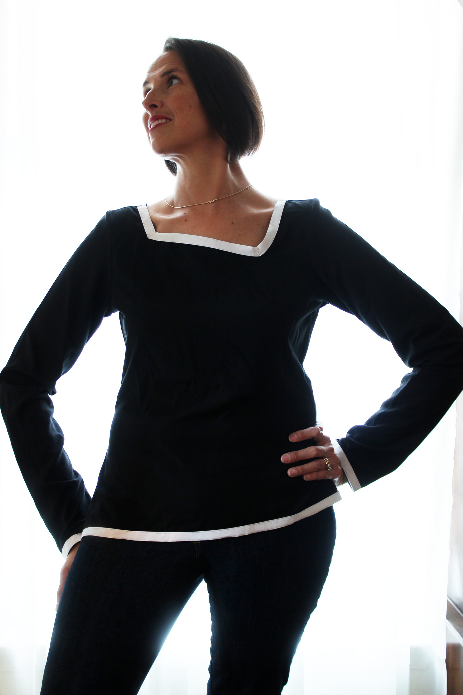 JB_Basic Black book review_asymmetrical blouse_looking aside.jpg