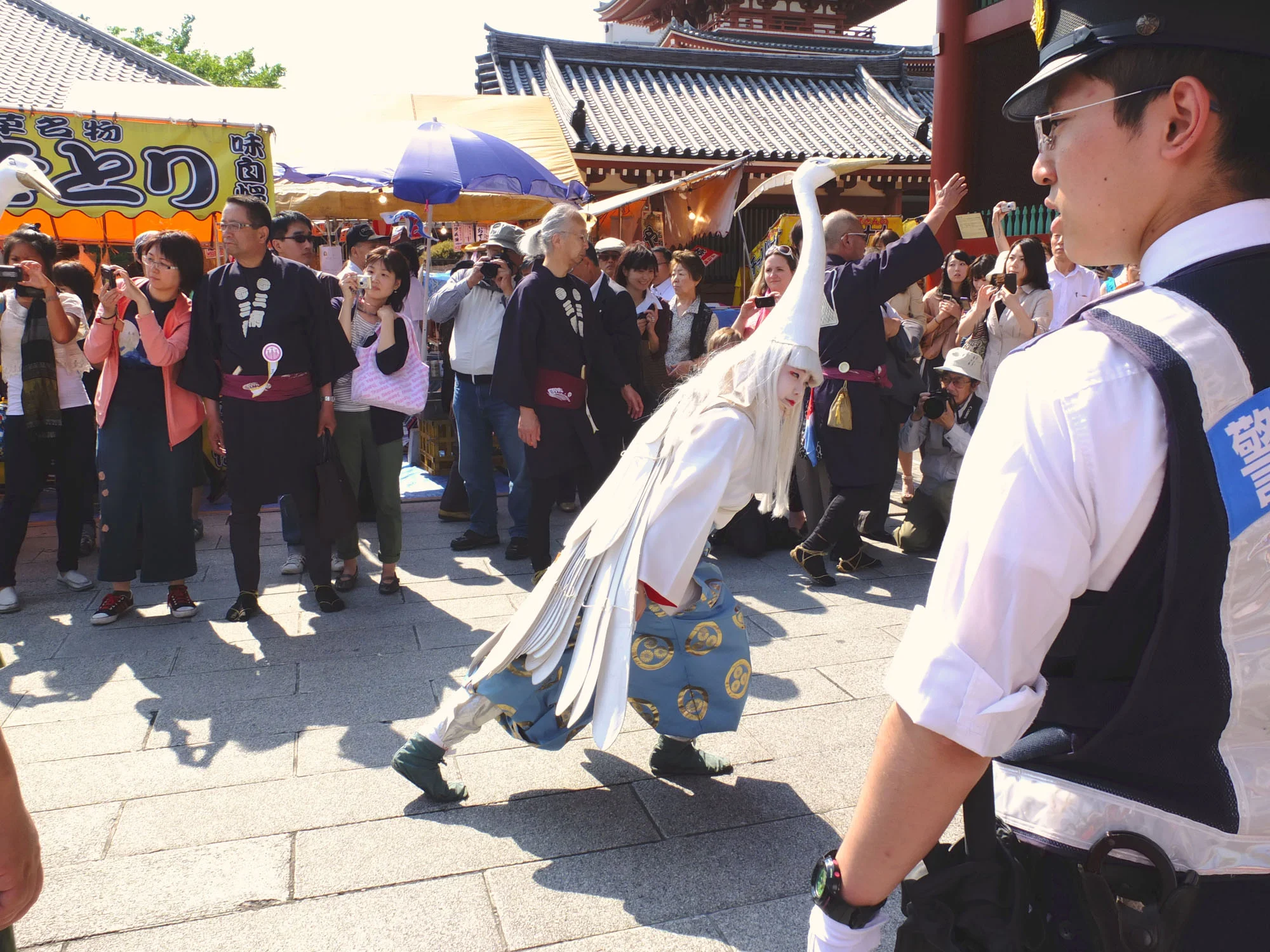 We were very fortunate we caught the occasion. I later found out this was the Sanja Matsuri (三社祭). One of the 3 great Shinto Festivals in Tokyo.