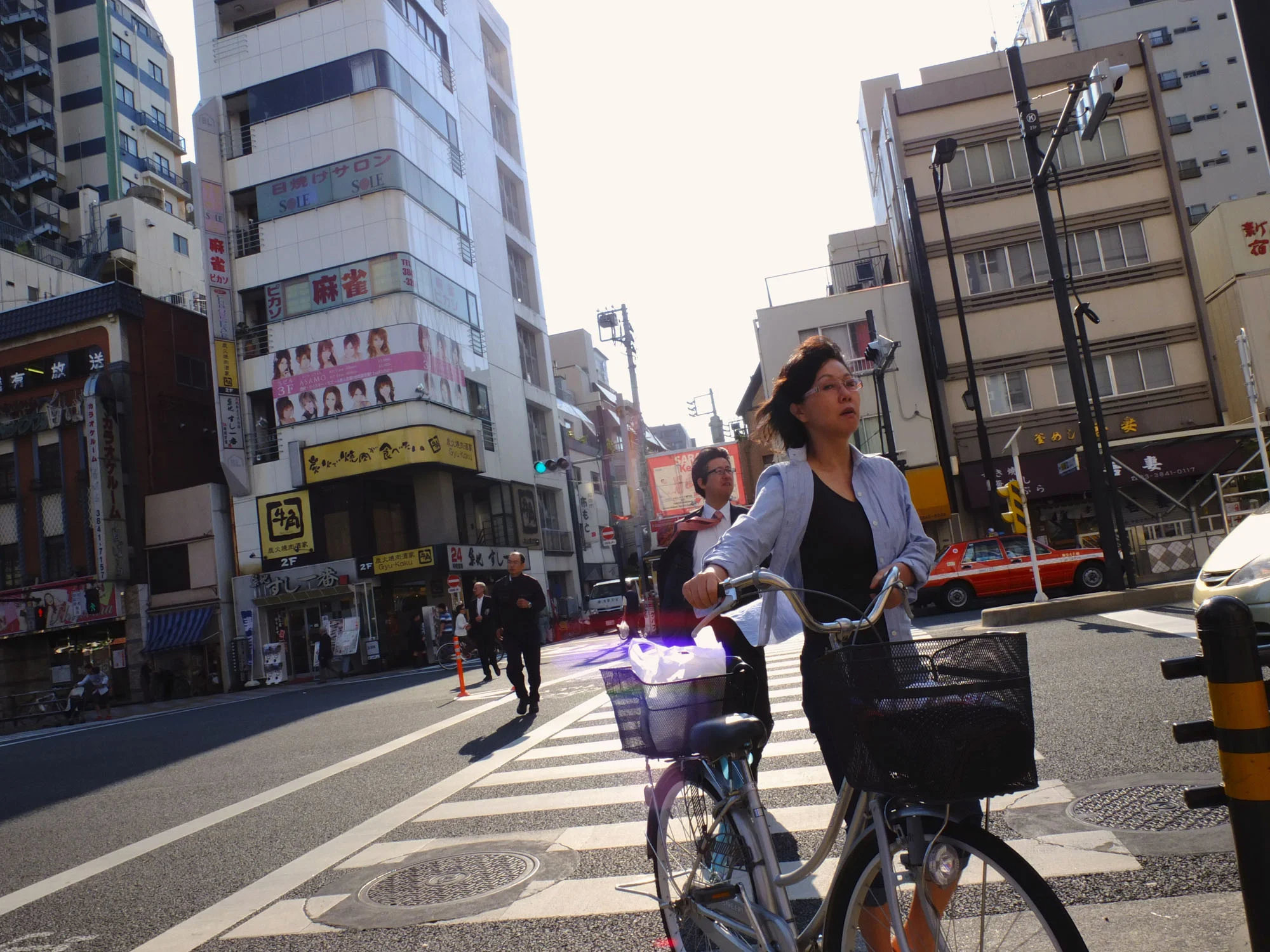 Bikes are a very popular form of transportation. Dedicated bike lanes split the sidewalks. I had to really watch out or else i'd run into bikers.