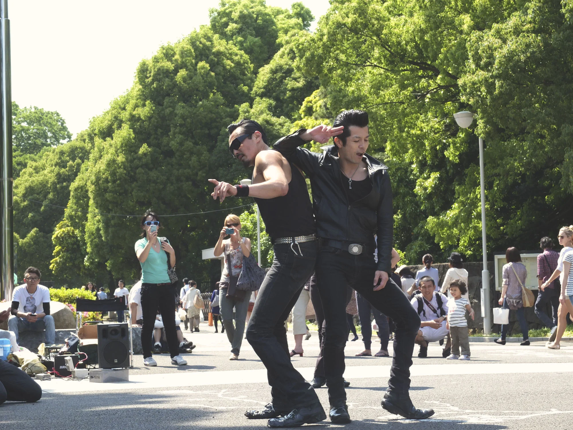 Yoyogi park is bustling with activity on a Sunday. Rockers come out to dance. Families come out to picnic and musicians come out to play.