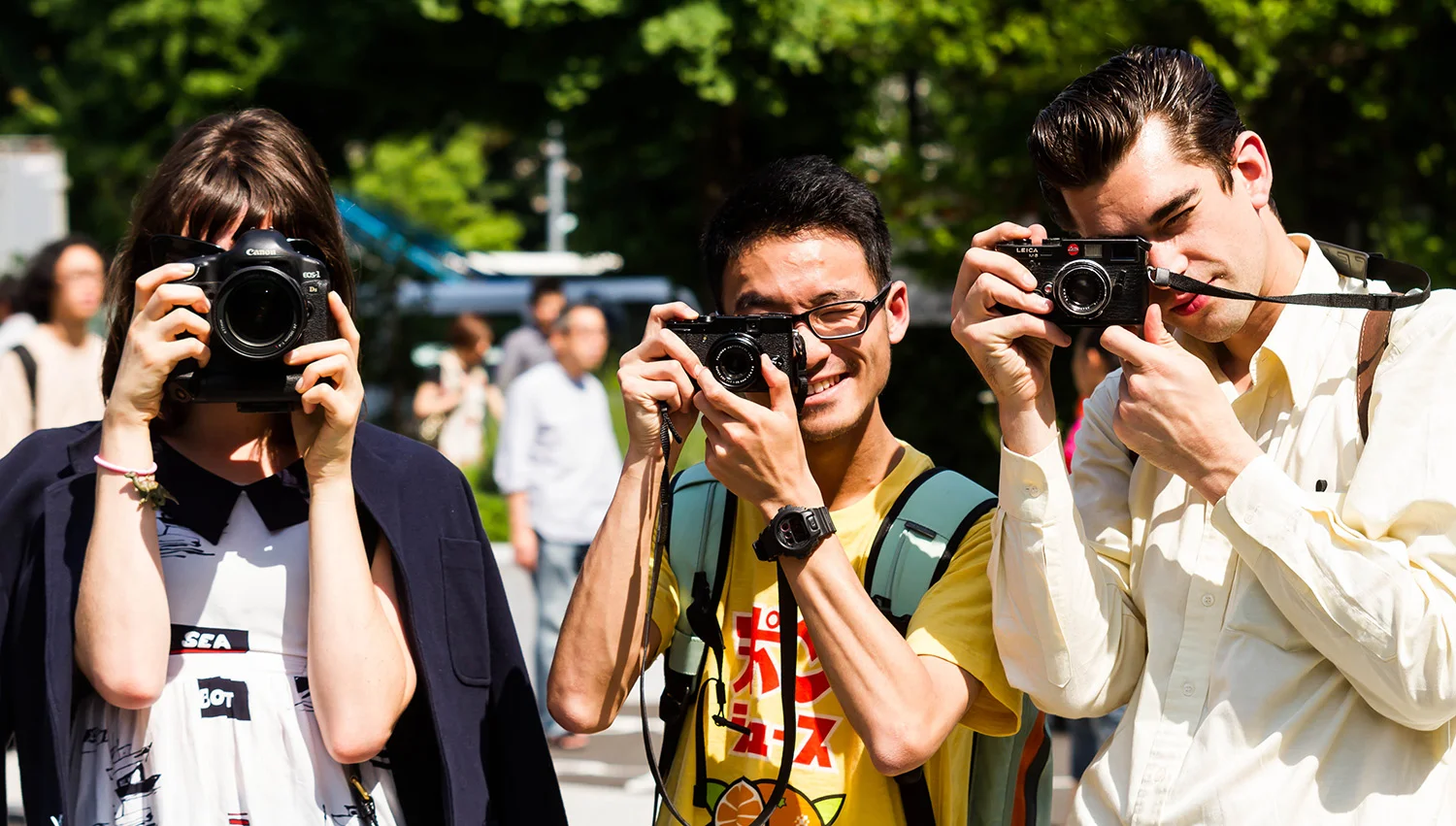 Some camera loving people. (I really want that guys camera...)