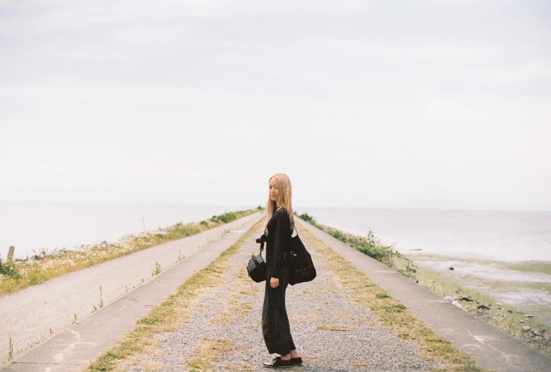 She quickly regret wearing all black when there was no shade to be found...