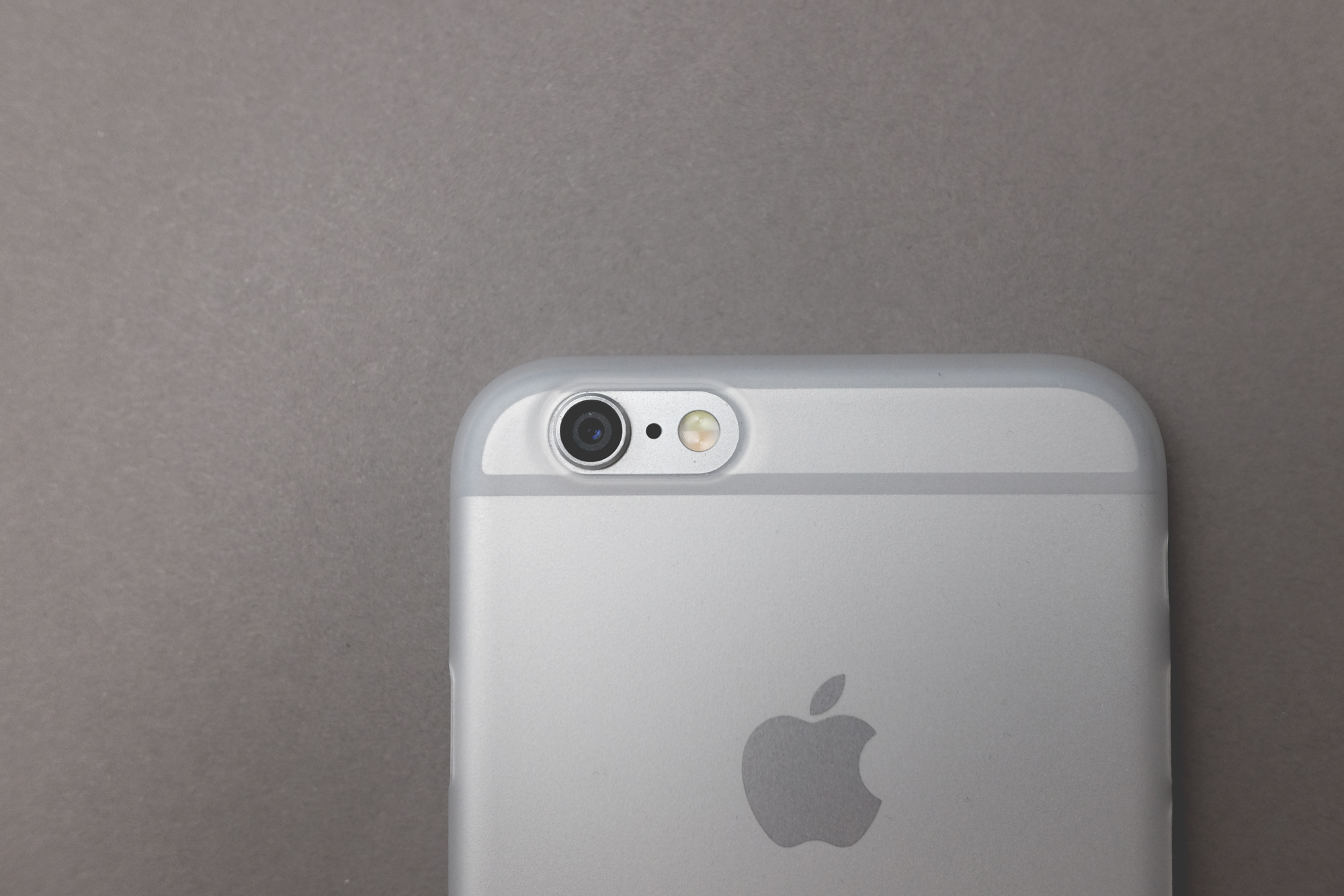  The frosted clear case offers a nice texture and enough clarity that the iPhone's design elements still remain visible.&nbsp; 