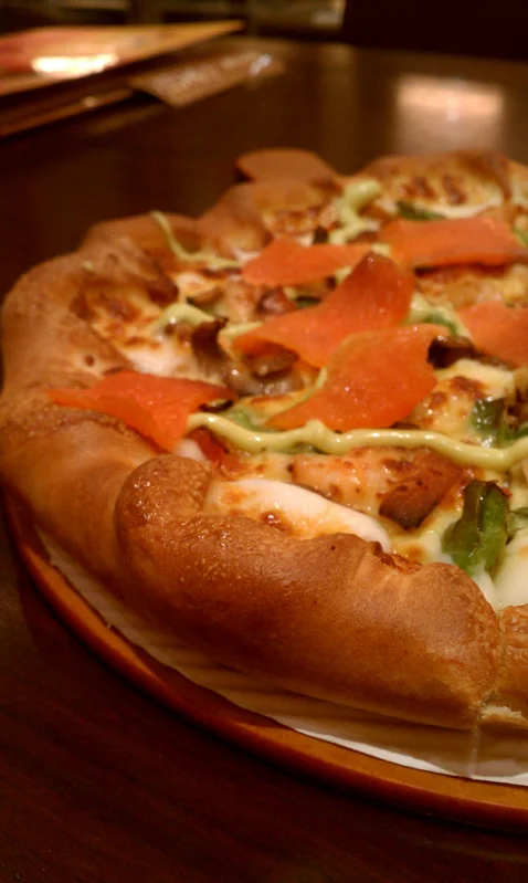 I ended up getting a mixed seafood stuffed-crust pizza topped with smoked salmon. Awesome.