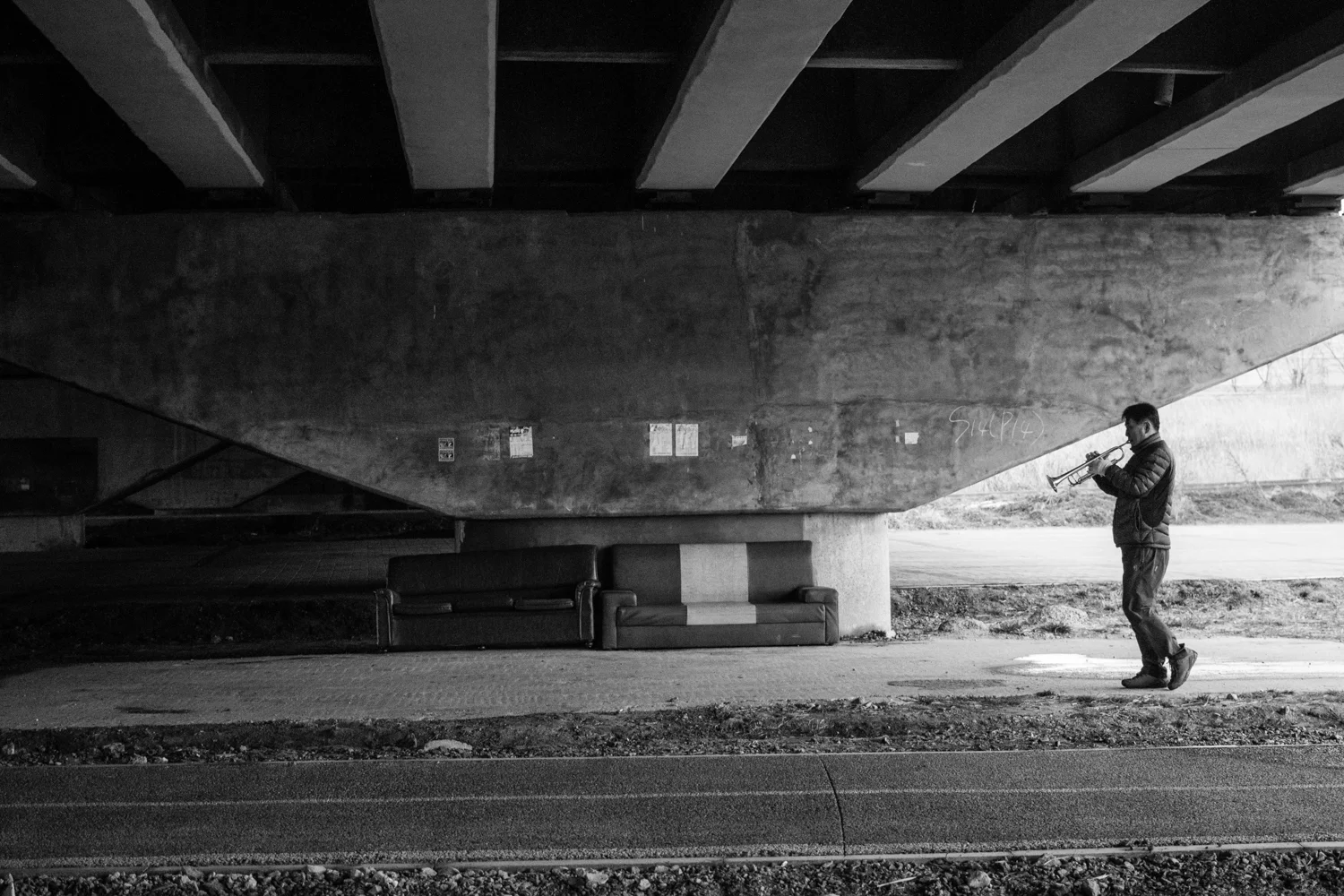 I found this man playing his trumpet under the same bridge the last picture was taken from.