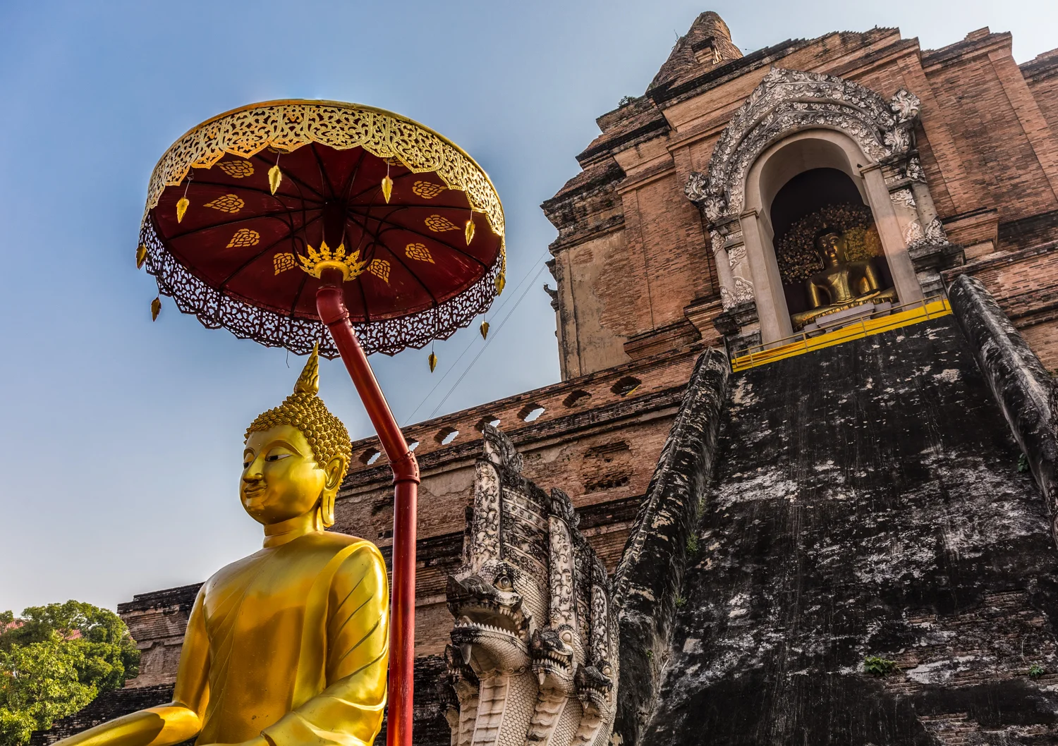 Wat Chedi Luang Worawihan, the largest of the wats in Chiang Mai's central district, is constructed from the same red clay bricks as the exterior walls.