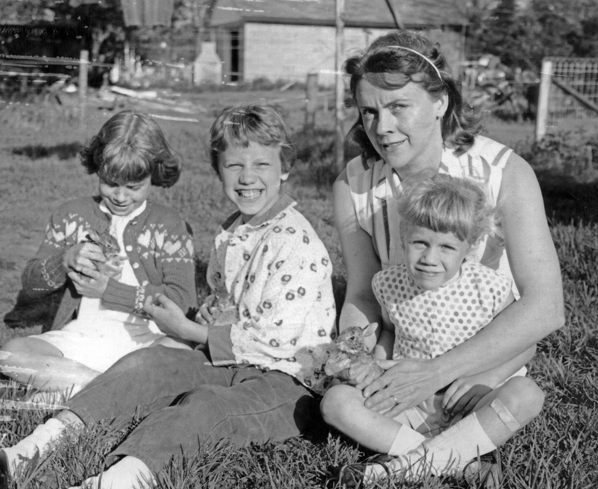 The three oldest kids with Mom and baby bunnies. (I’m the youngest.)
