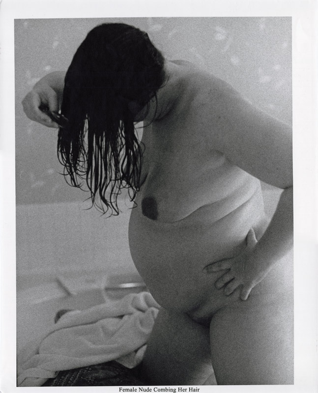 Female NudeCombing her hair